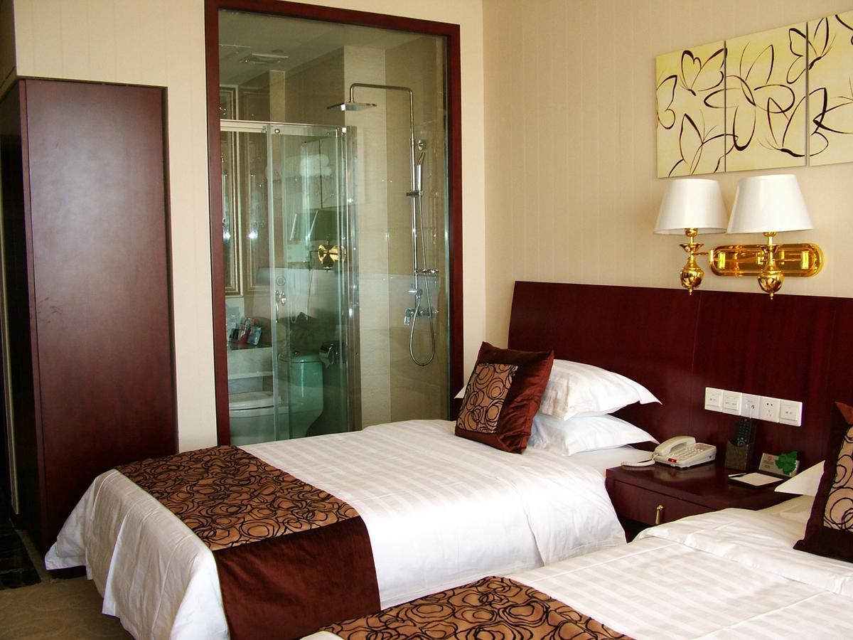 Fuxing Oriental Boutique Hotel Xích Phong Phòng bức ảnh