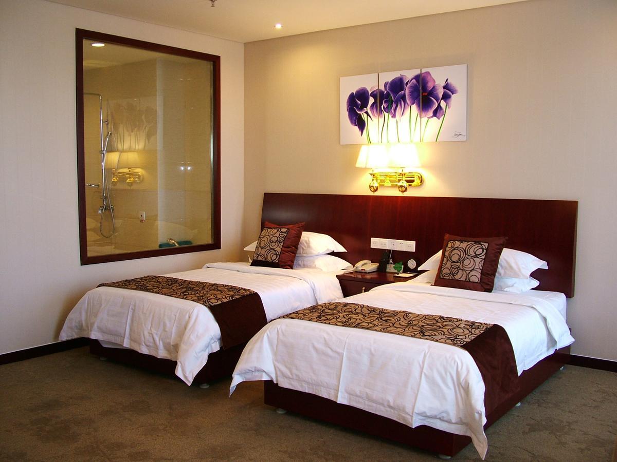 Fuxing Oriental Boutique Hotel Xích Phong Phòng bức ảnh